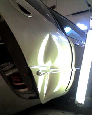 Mike Riley's paintless repair Dodge Before